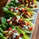 Fresh Romaine lettuce leaves filled with creamy chicken, crispy bacon, and ranch dressing
