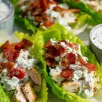 Fresh butter lettuce leaves filled with creamy ranch chicken, crispy bacon, and melted cheddar cheese.