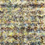 A top-down view of a golden Greek chicken lemon rice skillet with fresh herbs and lemon slices.