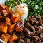 A meal prep bowl with roasted sweet potatoes, charred broccoli, and ground beef drizzled with hot honey glaze.
