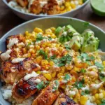 Healthy street corn chicken rice bowls with charred corn, grilled chicken, and cilantro lime rice in a meal prep container.